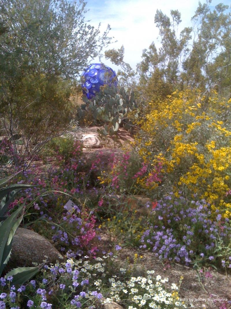 Blue Sphere In Flowers by Jeffrey Willenbrink